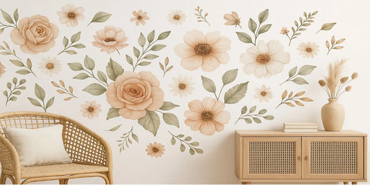 Boho floral peel-and-stick wall decals in soft earthy tones decorate a cozy living space with a rattan chair and wooden cabinet.